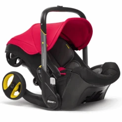 Doona Seggiolino Flame Red / Rosso Con Telaio Integrato, 2 In 1